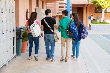 School administrator reviewing interactive digital floor plan on a tablet