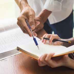 School district facility manager using digital platform to manage maintenance tasks